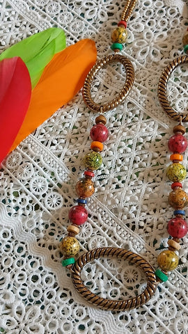 mulicolor beads attached with antique gold rings