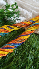 a multicolored twisted medium size long mala..