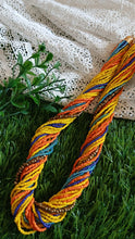 a multicolored twisted medium size long mala..